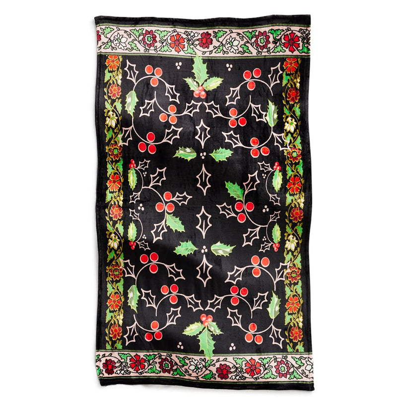 large fleece throw blanket with red and green holly pattern